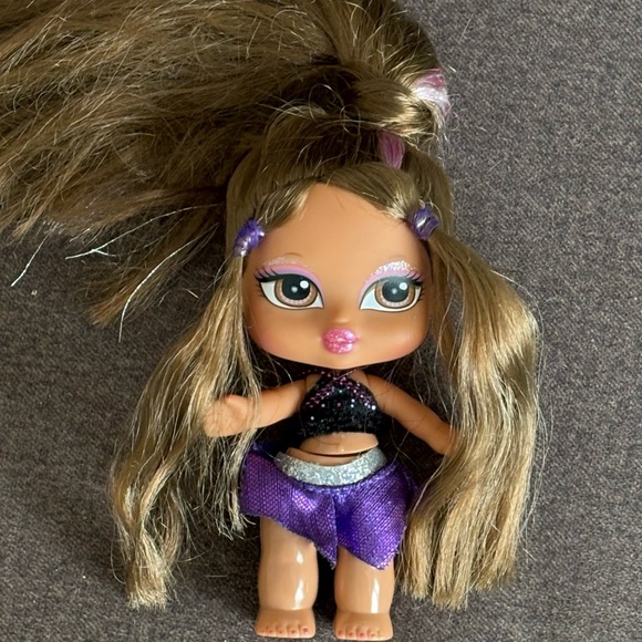 Bratz Other - Stylish Doll with Purple Skirt and Black Top
